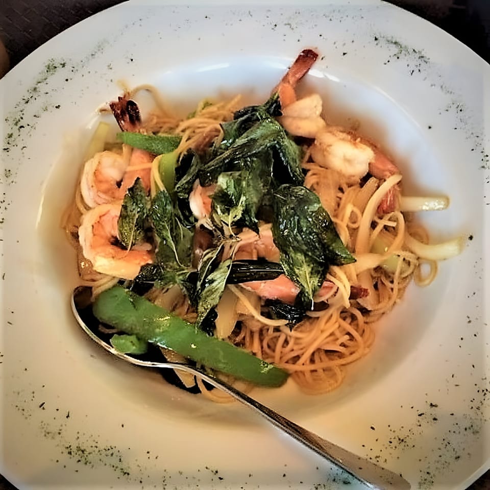 Table Thai Bar & Bistro's spicy spaghetti with shrimp, green beans, onions, and basil.